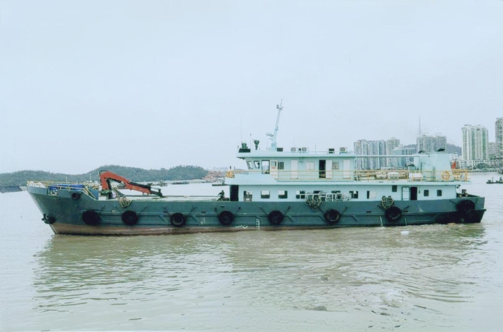 WAN-CARGO-003 cargo ship with orange crane moored at port