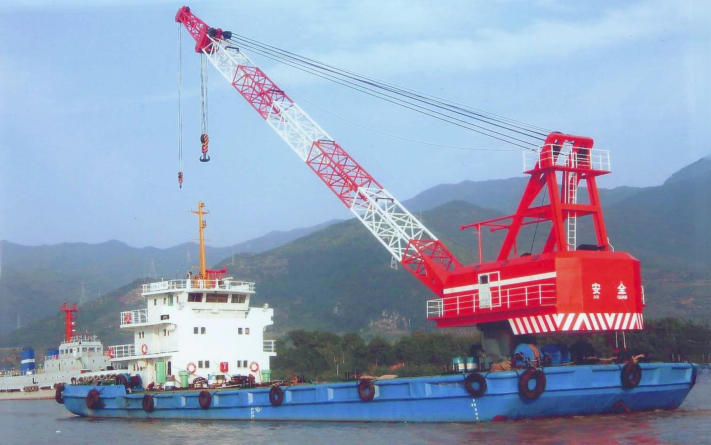 WAN-CRANE-001 self-propelled revolving floating crane with red lattice crane on blue barge