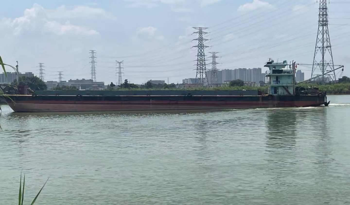 WAN-LCT-003 landing craft tank vessel on river with industrial landscape