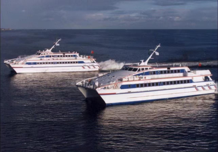 WAN-PAX-005 high-speed aluminium catamaran — photograph shows two vessels; offered-vessel identity requires confirmation