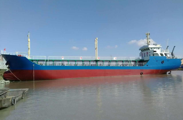 WAN-TANK-003 oil tanker at berth under clear sky